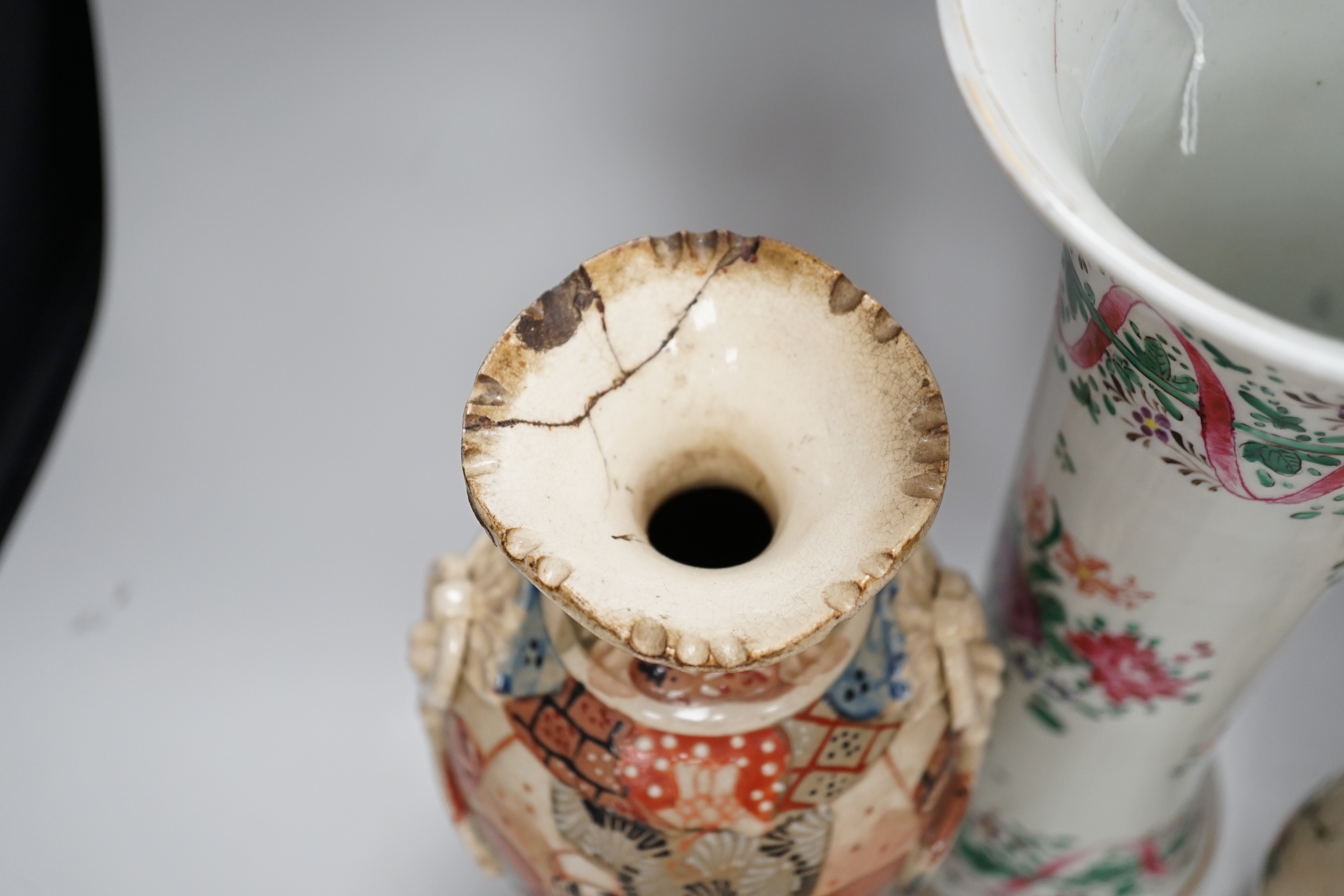 A group of Japanese vases and a Satsuma saucer, 30cm high